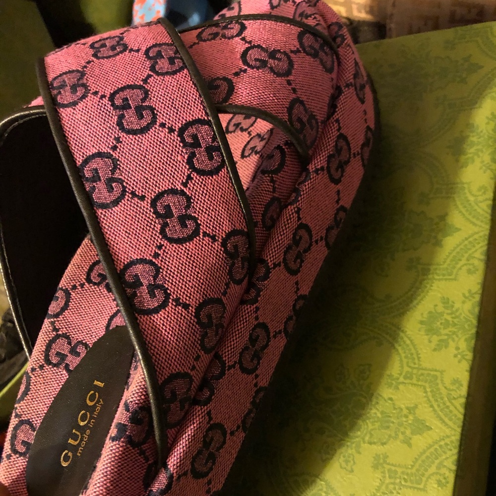 Dark pink Gucci slides